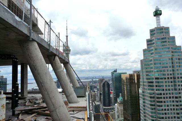 Angled columns on the L Tower's north side with the Financial District prominent in the background